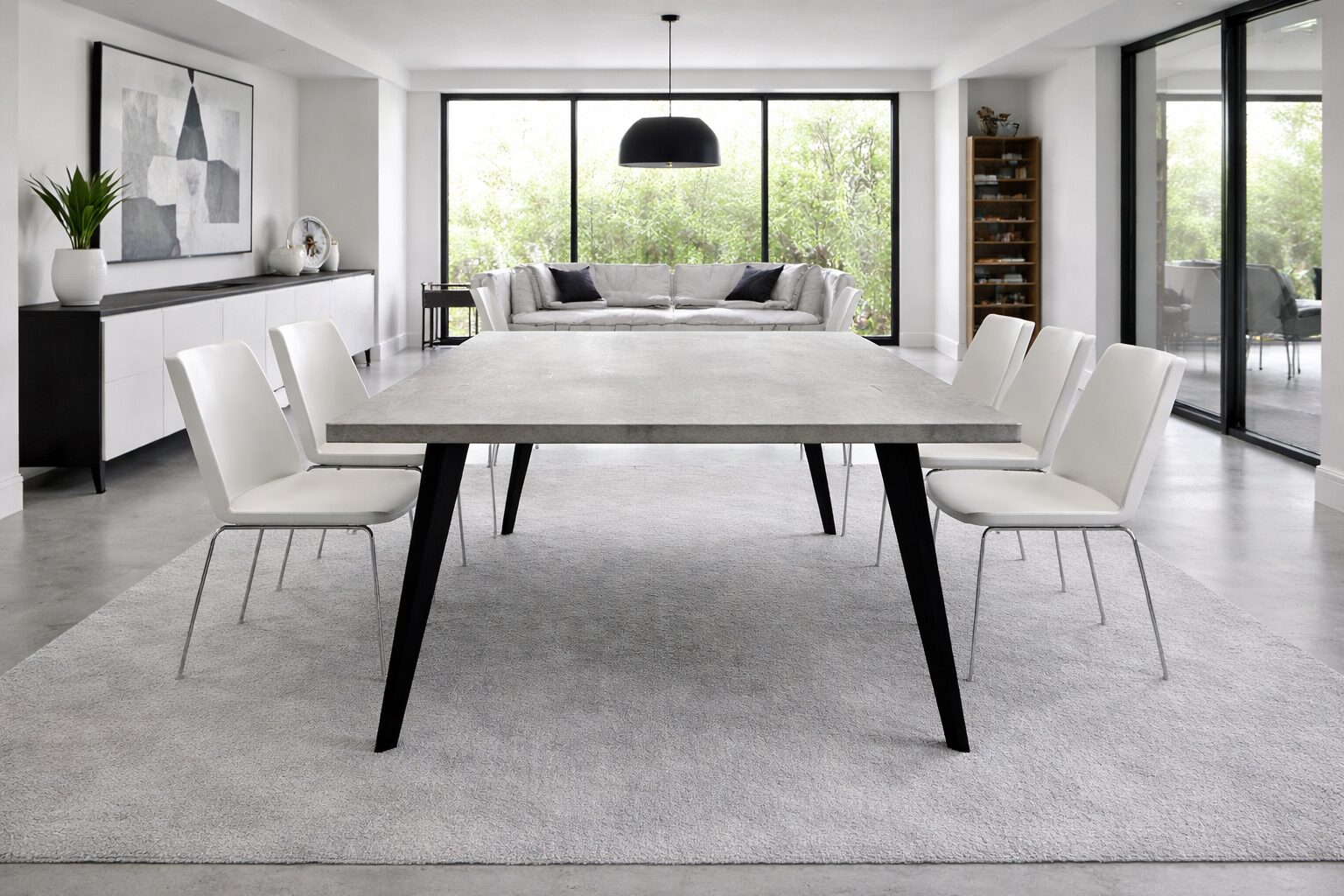 Table béton ciré réalisée entièrement à la main et personnalisable. Caractéristiques : Plateau béton ciré reposant sur 4 pieds acier inclinés Matière pieds : acier noir (réalisé en France)